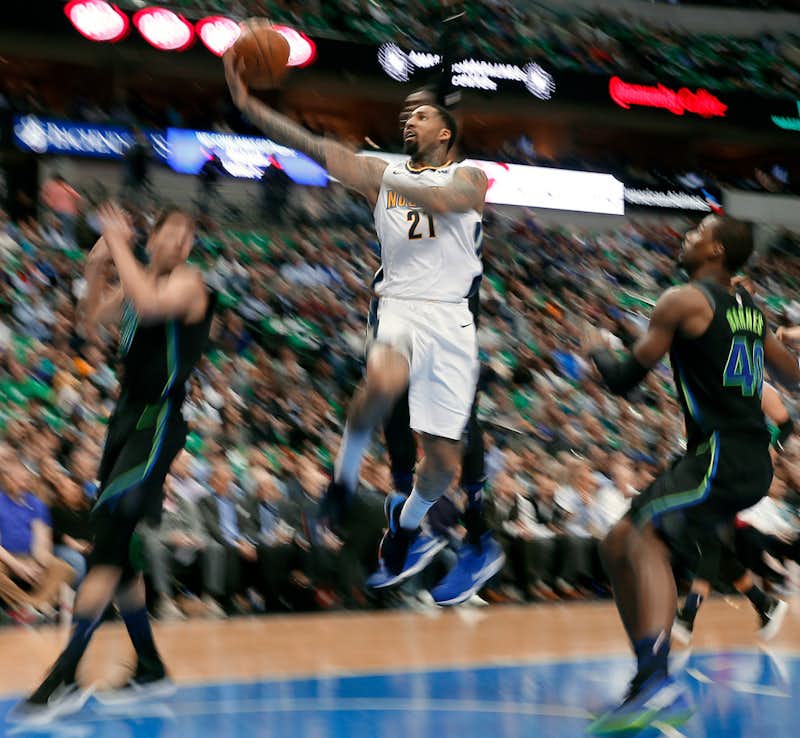 Ferrell, Nowitzki lead Mavs to victory against Nuggets